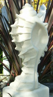 spikey sea-shell
I actually dug a spikey shell out of our garden and have no idea how it got here so far from the sea. This is what gave me the idea for this statue which is slightly modified to allow for strength. I really like the contrast between the soft curves and the viscious looking spikes. 
750mm tall
(SOLD)
