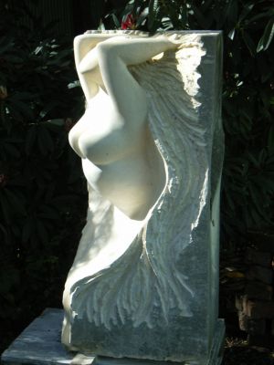 Escape (side view)
My daughter actually suggested a lady escaping from a piece of stone... so here she is...
My lady is pushing her way out of the stone and into the light, and evolving as she does.
Her body is ultra-smooth and lovely to touch, her hair which is being torn free from the stone is rough, and the rest of the stone from is unsealed so it  is grey and aged.

